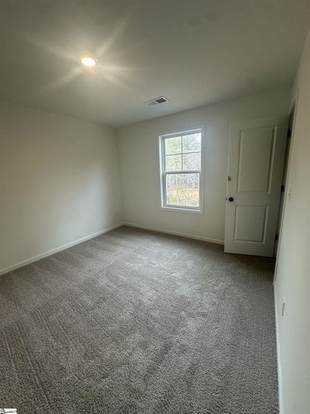 Spacious, unfurnished interior of a new home in Shiloh Trail, Wellford (Image 24).