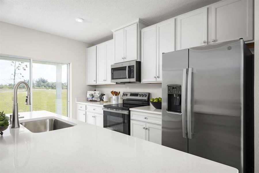 Furnished interior view inside a new home in Waverly Homes, Port St. Lucie (Image 3).