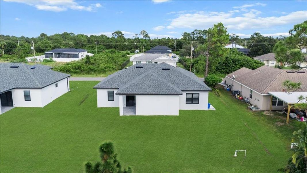 Exterior details and patio area of a home in , Lehigh Acres (Image 4).