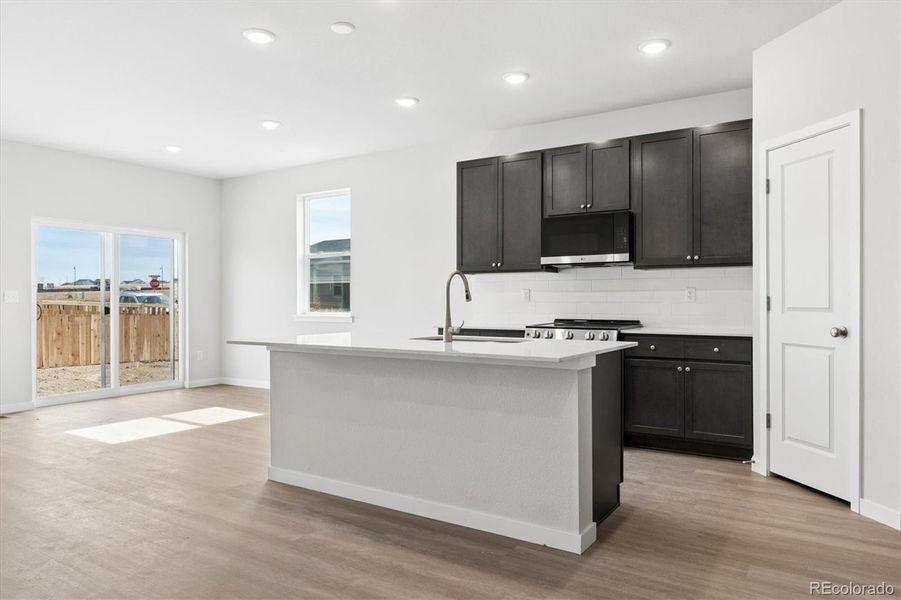 Furnished interior view inside a new home in Sweetgrass, Dacono (Image 9).