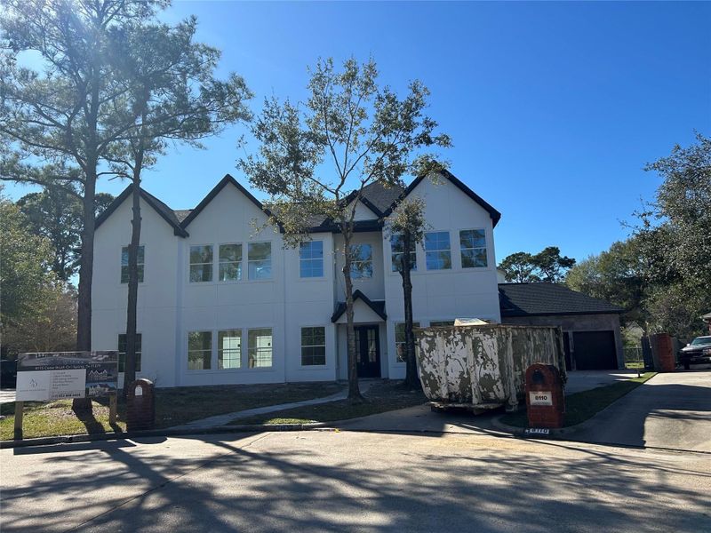 Front exterior of a new home in , Spring, TX, highlighting curb appeal (Image 5).