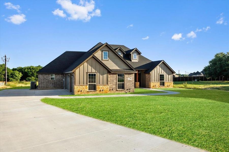 Front exterior of a new home in , Weatherford, TX, highlighting curb appeal (Image 15). Front exterior of a new home in , Weatherford, TX, highlighting curb appeal (Image 15).