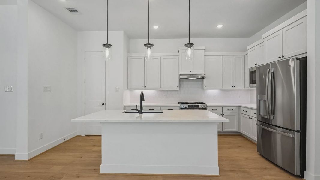 Representative furnished interior of a home built from the Oxford by Chesmar Homes in Parkside on the River, Georgetown (Image 7).