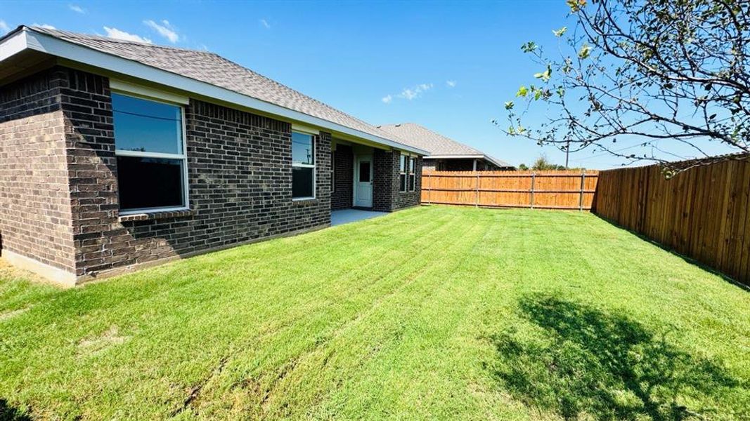 Front exterior of a new home in Meadowbrook Estates, Cleburne, TX, highlighting curb appeal (Image 1). Front exterior of a new home in Meadowbrook Estates, Cleburne, TX, highlighting curb appeal (Image 1).