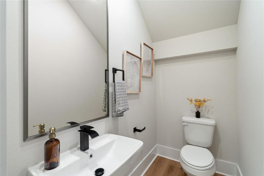 Thoughtfully positioned on the main floor, the powder bath adds everyday convenience for guests and entertaining. Thoughtfully positioned on the main floor, the powder bath adds everyday convenience for guests and entertaining.