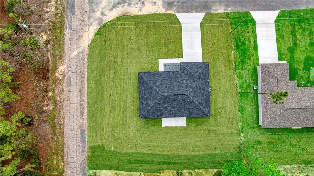 Front exterior of a new home in , Citrus Springs, FL, highlighting curb appeal (Image 1). Front exterior of a new home in , Citrus Springs, FL, highlighting curb appeal (Image 1).