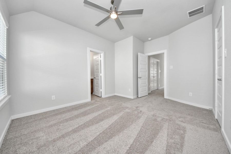 Generously sized secondary bedrooms featuring spacious closets, soft and inviting carpeting underfoot, large windows allowing plenty of natural light, and the added touch of privacy blinds for your personal retreat. Sample photo of completed home with similar floor plan. Actual colors and selections may vary. Generously sized secondary bedrooms featuring spacious closets, soft and inviting carpeting underfoot, large windows allowing plenty of natural light, and the added touch of privacy blinds for your personal retreat. Sample photo of completed home with similar floor plan. Actual colors and selections may vary.