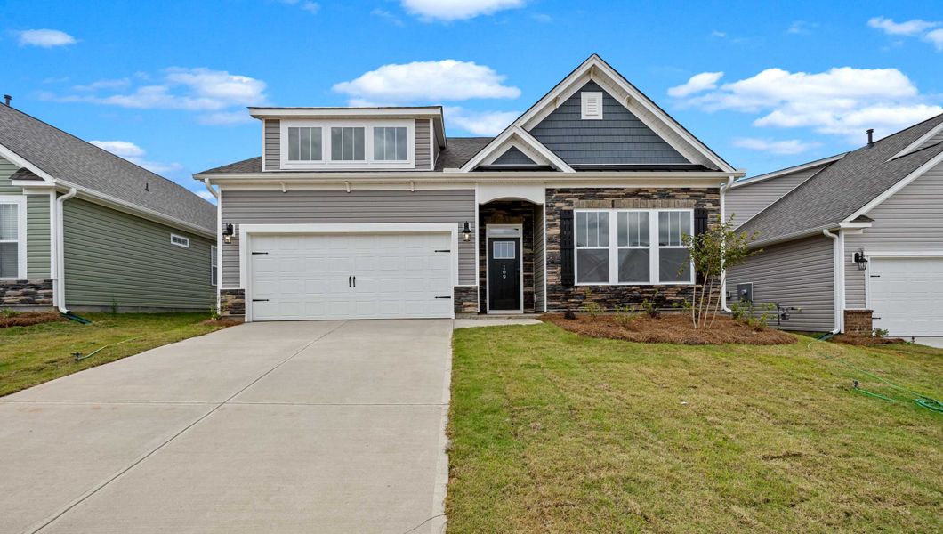 Front exterior of a new home in Cottonwood Ridge, Piedmont, SC, highlighting curb appeal (Image 1).