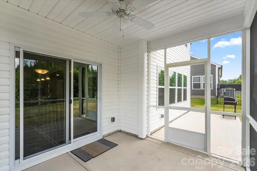 Exterior details and patio area of a home in , Troutman (Image 24).