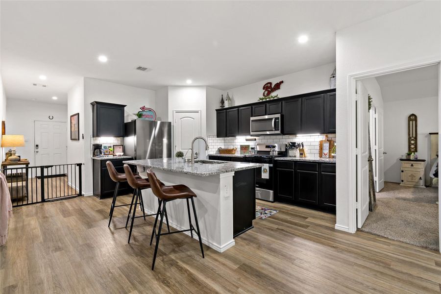 Furnished interior view inside a new home in Harrington Trails at The Canopies, New Caney (Image 11). Furnished interior view inside a new home in Harrington Trails at The Canopies, New Caney (Image 11).
