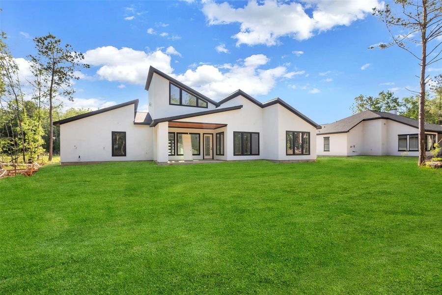 Striking modern facade with bold architectural lines. Striking modern facade with bold architectural lines.