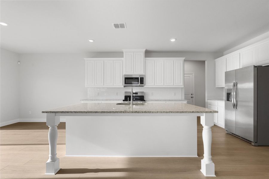 Representative furnished interior of a home built from the Garrison I by Cheldan Homes in Stoneview, Glen Rose (Image 13).