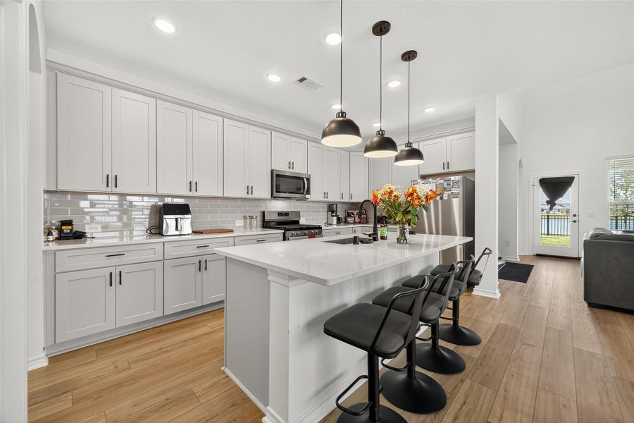 Furnished interior view inside a new home in Sunterra, Katy (Image 19).