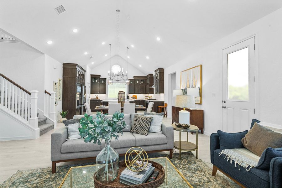 Open living space with high vaulted ceilings (*Photo not of actual home and used for illustration purposes only.)