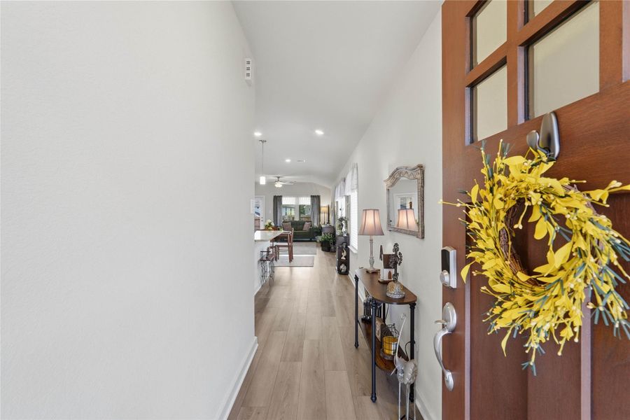 Step through the front door and you're welcomed by a bright, inviting space that immediately feels like home.