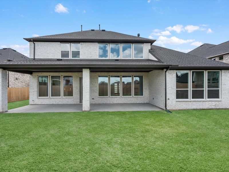 Exterior details and patio area of a home in Harvest Green, Richmond (Image 3). Exterior details and patio area of a home in Harvest Green, Richmond (Image 3).
