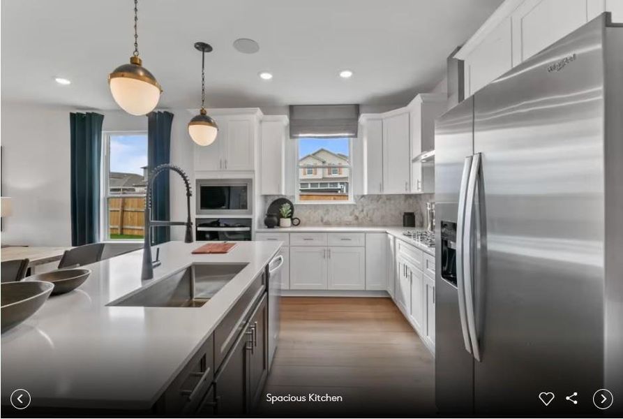 Interior photos- Photo of Pulte model home with same floor plan, not of actual home listed.