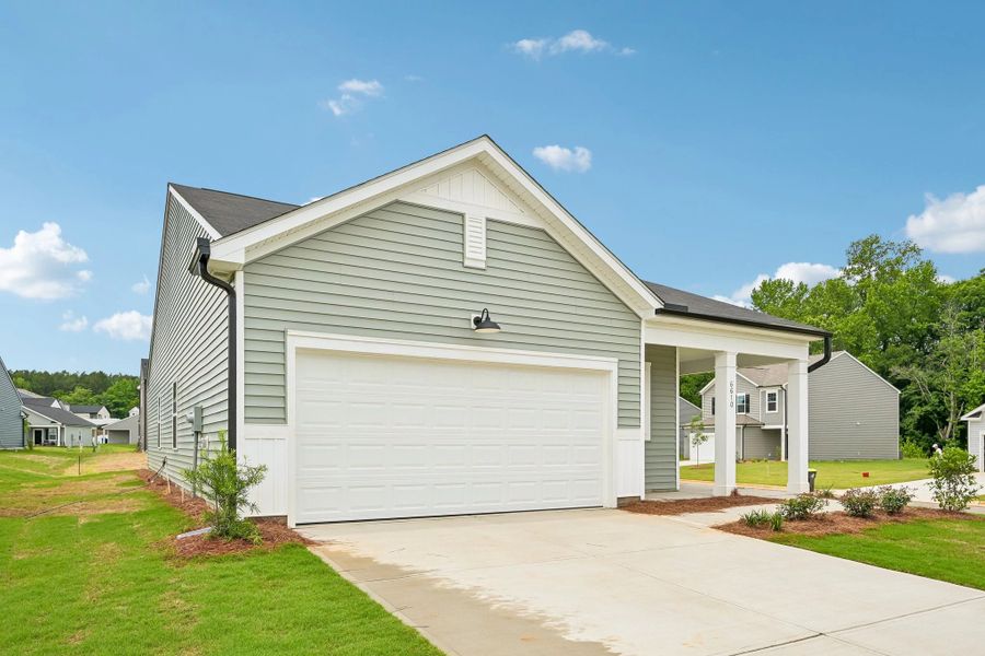 Front exterior of a new home in Middleton Farms, Middlesex, NC, highlighting curb appeal (Image 2). Front exterior of a new home in Middleton Farms, Middlesex, NC, highlighting curb appeal (Image 2).