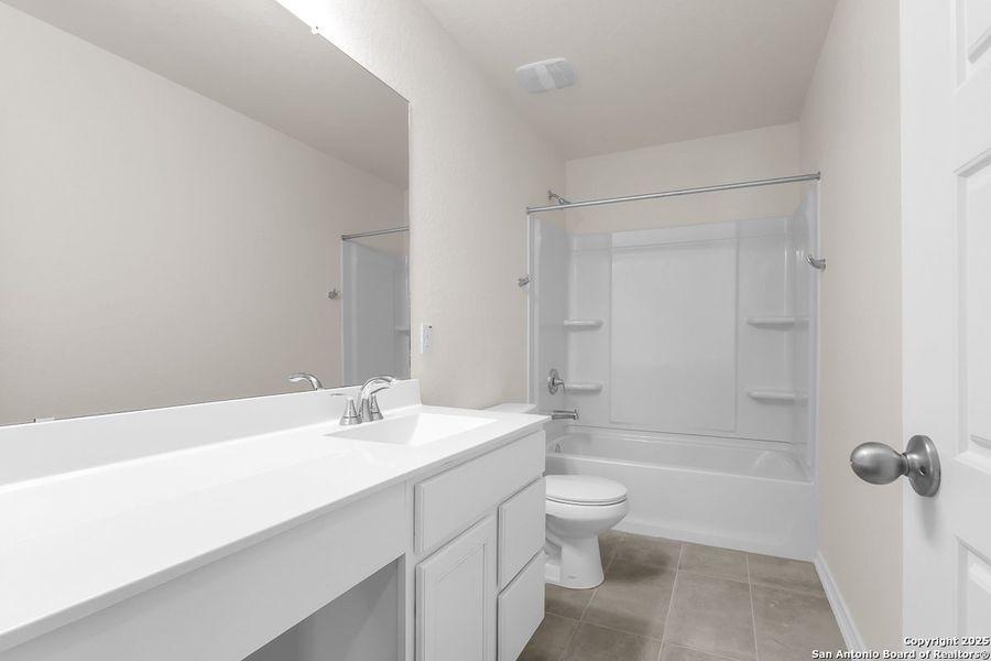 Furnished interior view inside a new home in Spanish Trails, San Antonio (Image 6).