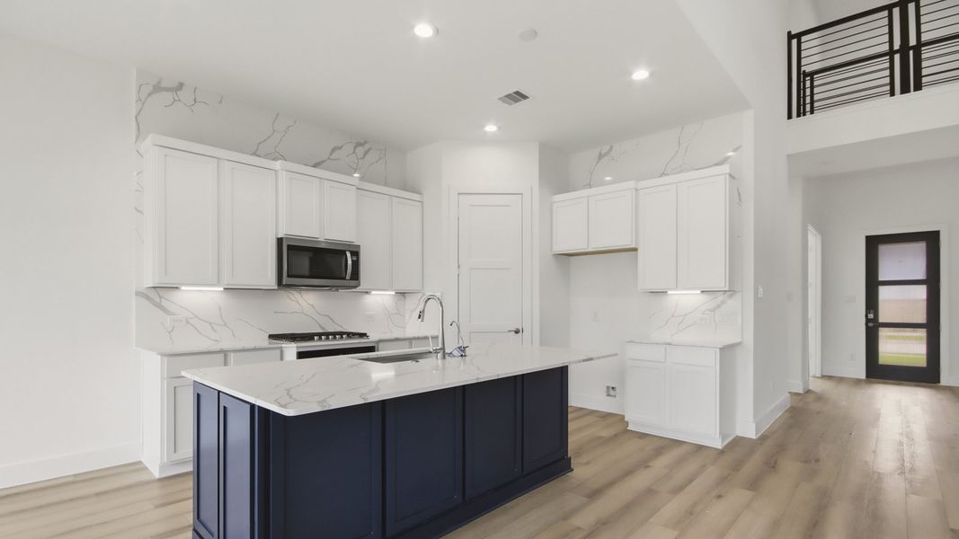 Furnished interior view inside a new home in Hills of Westlake, Conroe (Image 7).