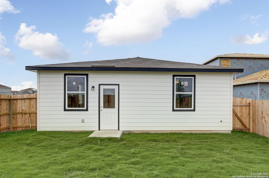 Front exterior of a new home in Applewhite Meadows, San Antonio, TX, highlighting curb appeal (Image 9).