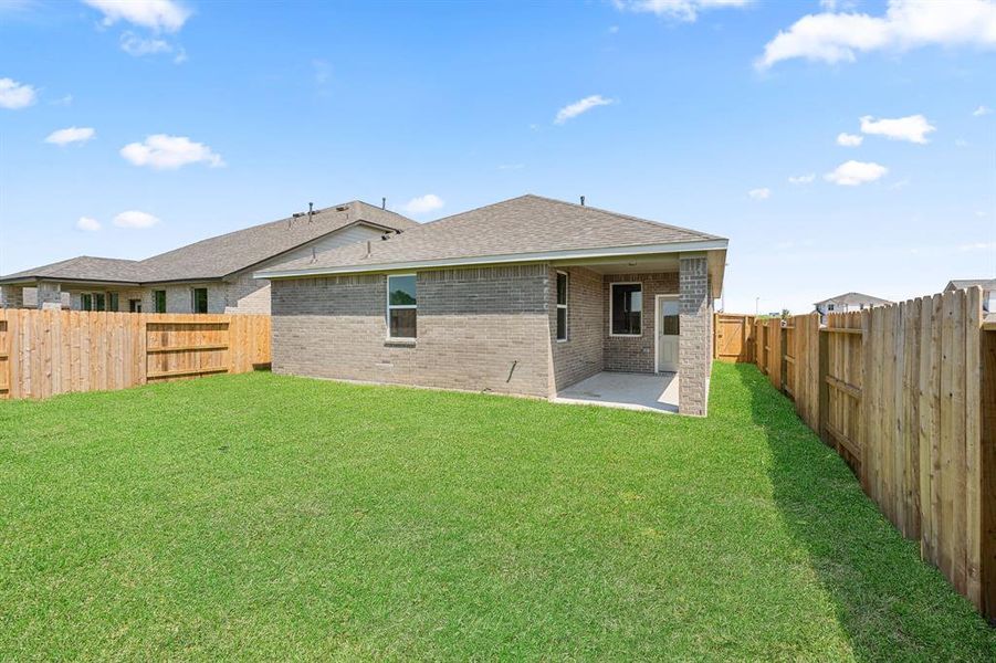 This backyard is perfect for family gatherings, social events, or simply unwinding in the fresh air.