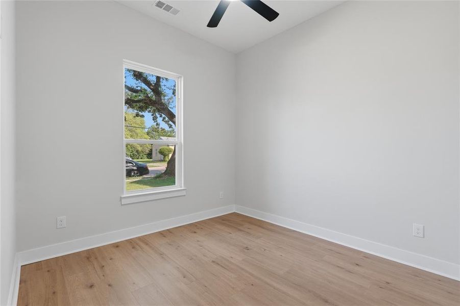 Neutral wall tones with wood-finish flooring Neutral wall tones with wood-finish flooring