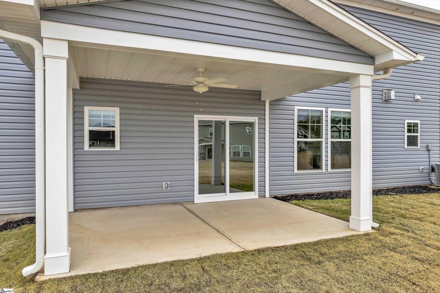 Exterior details and patio area of a home in Sedona, Greenville (Image 3).