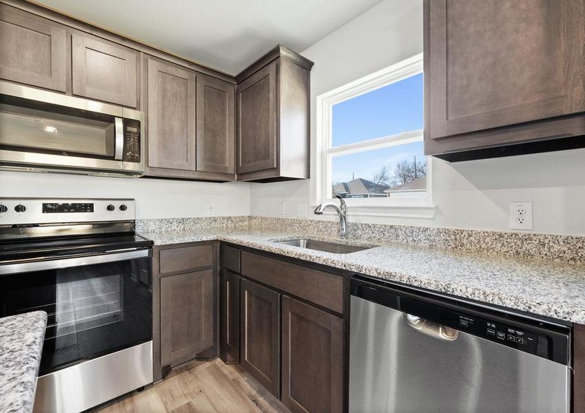 The kitchen of the Blanco has gorgeous wood cabinetry.