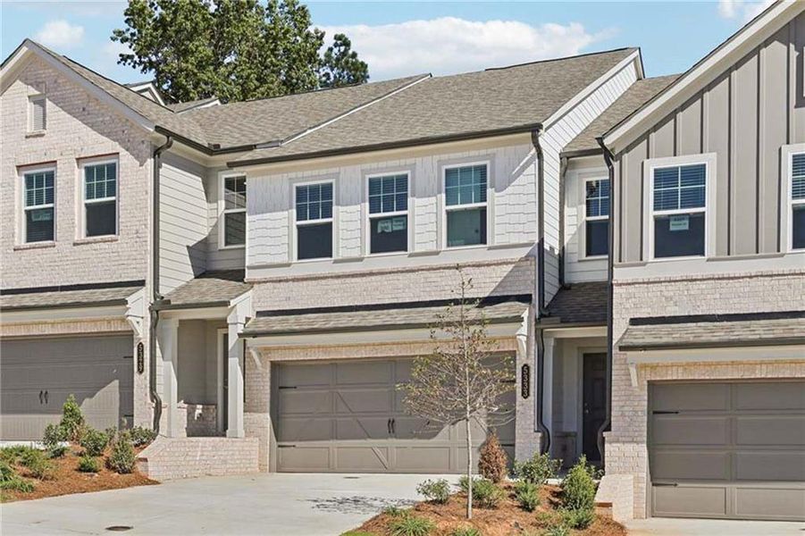 Front exterior of a new home in Eastlyn Crossing, Flowery Branch, GA, highlighting curb appeal (Image 18).