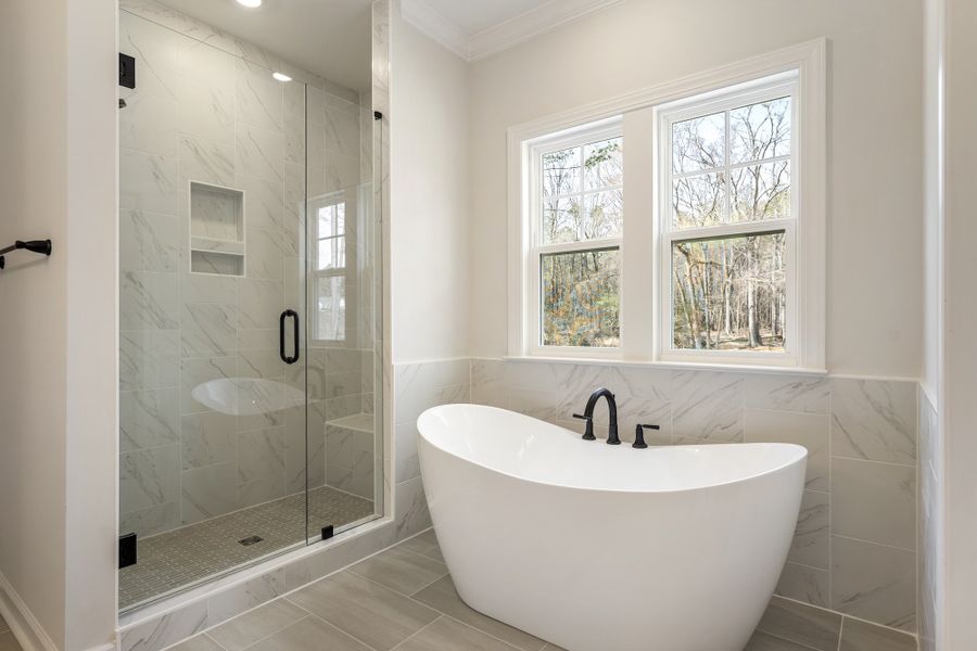 Furnished interior view inside a new home in Landing at Pine Lake, Anderson (Image 13).