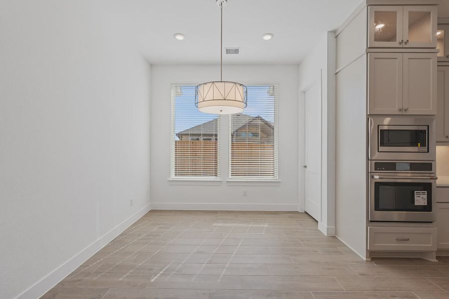 Representative unfurnished interior of a home built from the Brentwood by Chesmar Homes in Meridiana 50's and 60's, Manvel (Image 13).