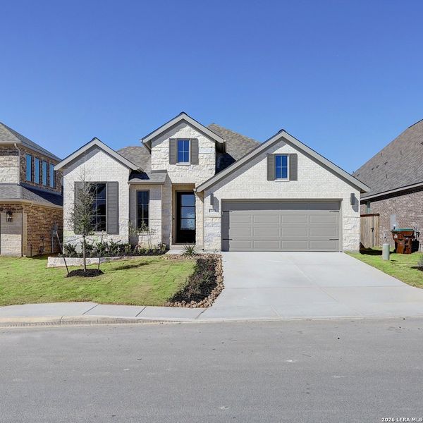 Front exterior of a new home in Arcadia Ridge, San Antonio, TX, highlighting curb appeal (Image 1). Front exterior of a new home in Arcadia Ridge, San Antonio, TX, highlighting curb appeal (Image 1).