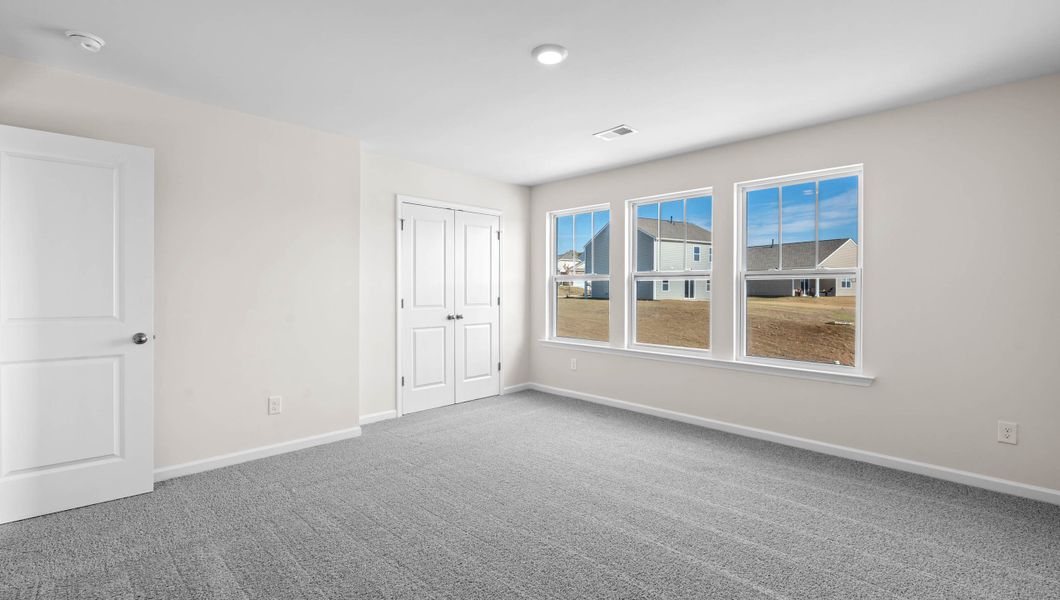 Representative unfurnished interior of a home built from the Biltmore by D.R. Horton in Hunters Ridge, Woodruff (Image 25).