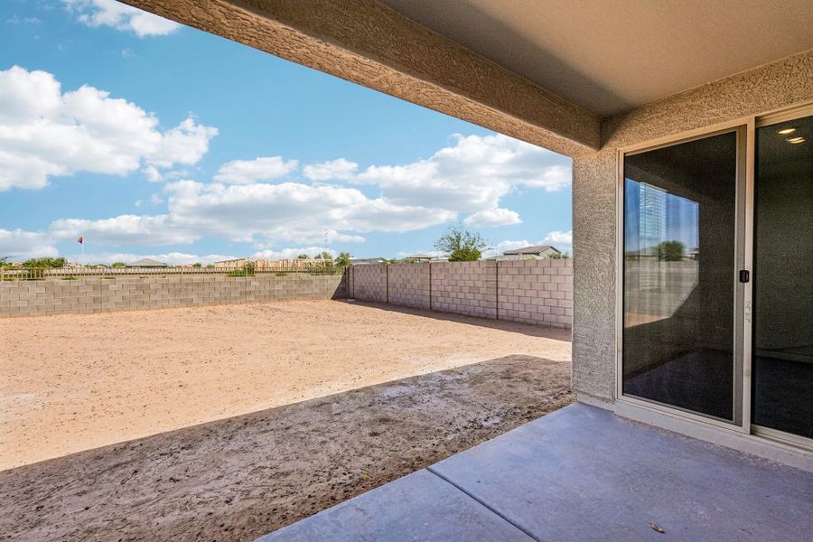 Covered patio to large backyard Covered patio to large backyard