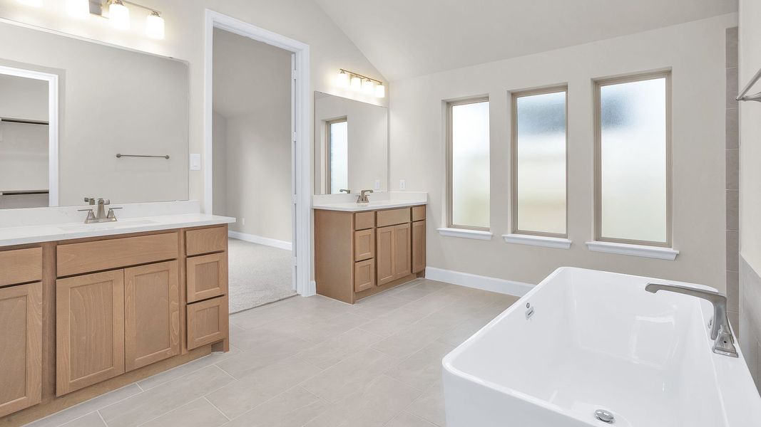 Furnished interior view inside a new home in Woodhavyn, Magnolia (Image 7).
