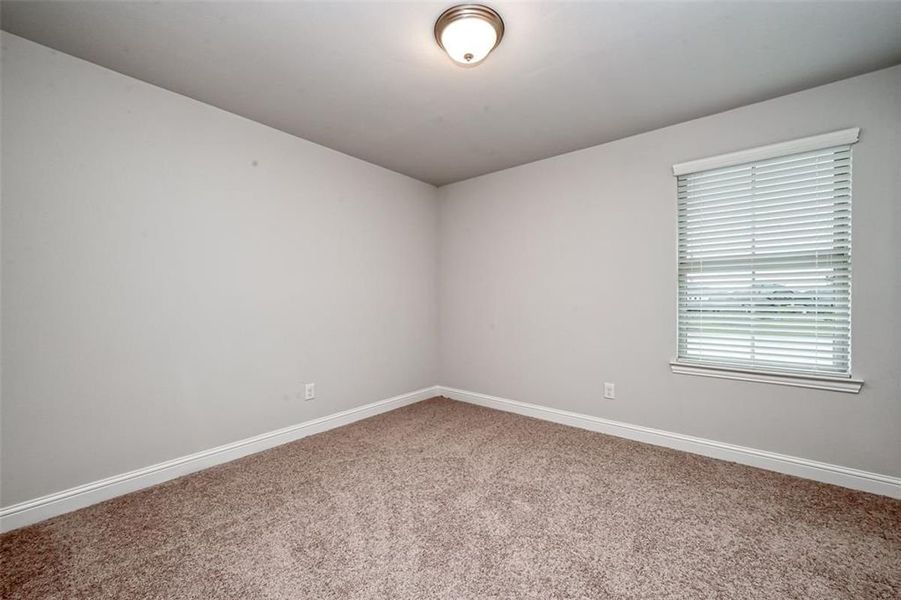 Representative unfurnished interior of a home built from the Plan 2500 by Adams Homes in The Bluffs at Lafayette, Freeport (Image 35).