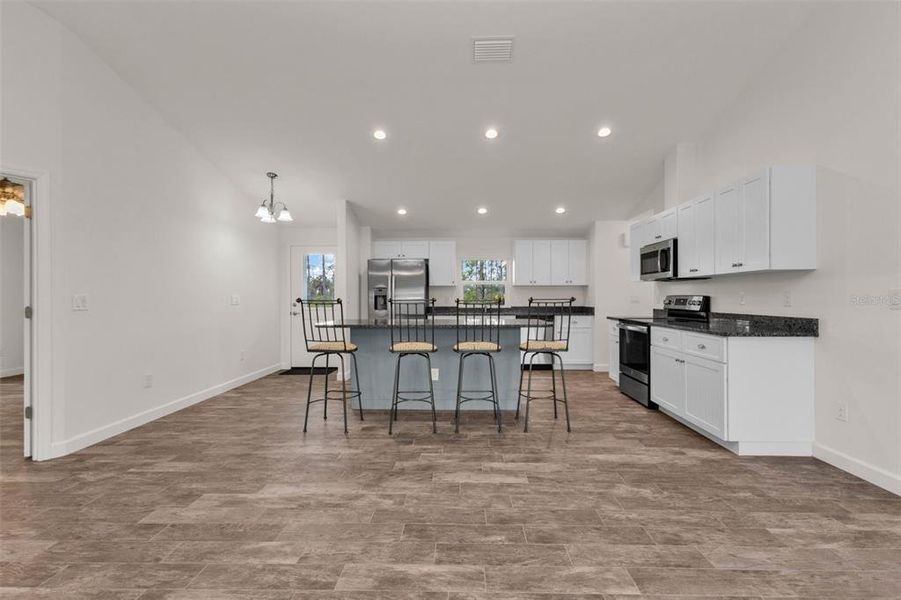 Furnished interior view inside a new home in , Port Charlotte (Image 13).