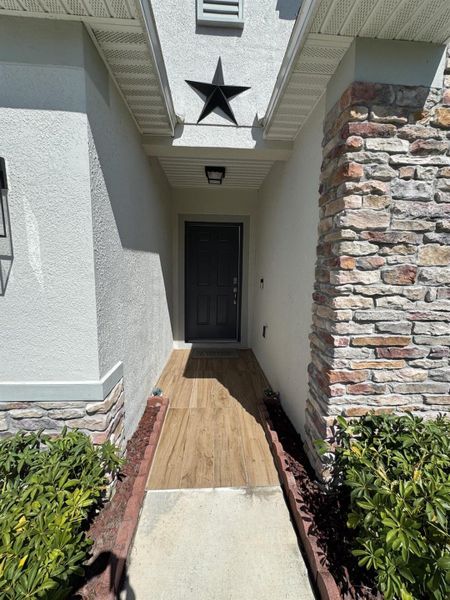 Front exterior of a new home in , Port St. Lucie, FL, highlighting curb appeal (Image 19).