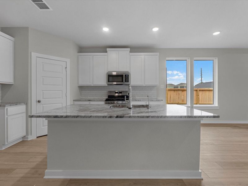 Furnished interior view inside a new home in Mason Woods, Cypress (Image 4).