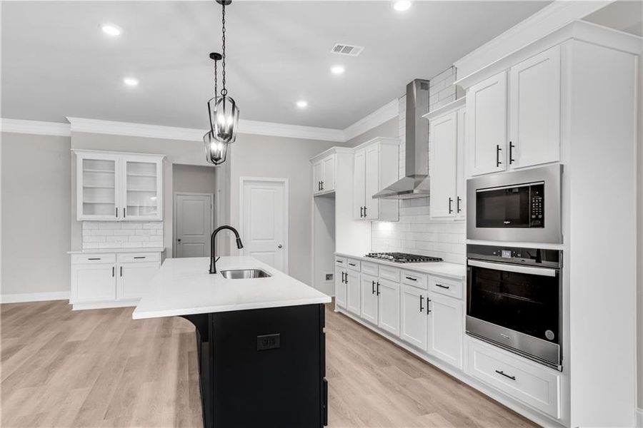 Furnished interior view inside a new home in Hidden Fields, Hoschton (Image 7).