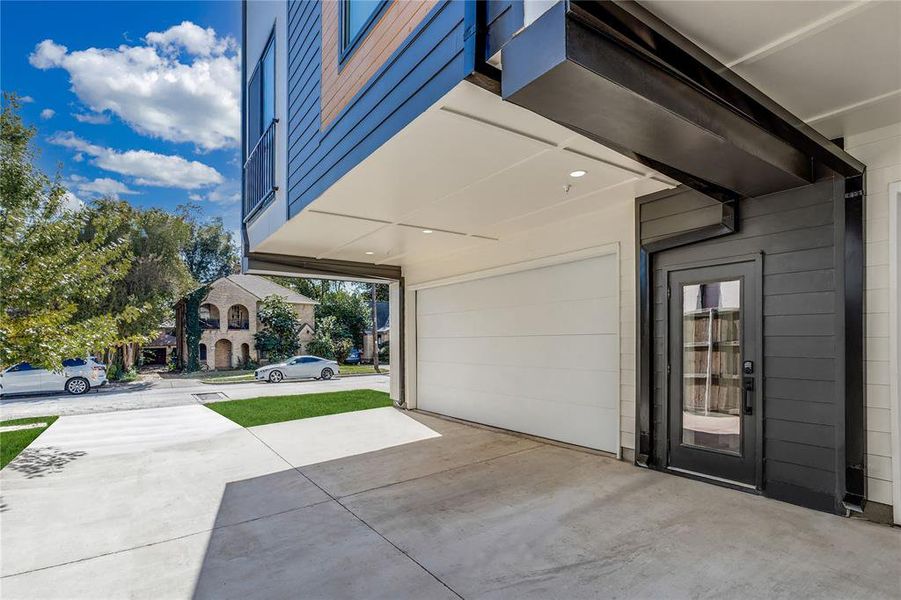 Garage with concrete driveway