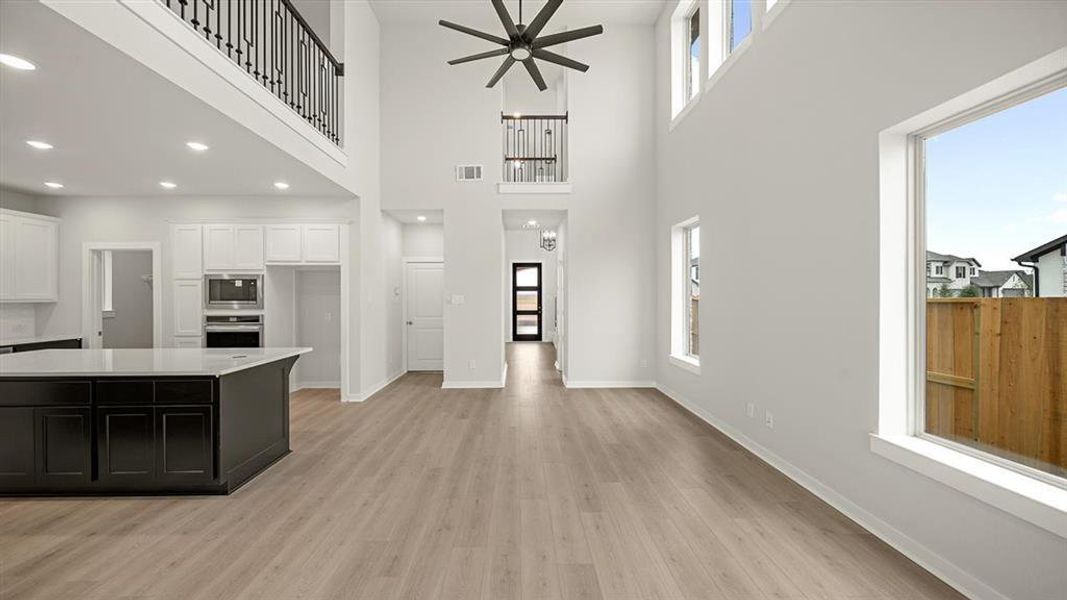 Two Story Ceiling With High Windows!