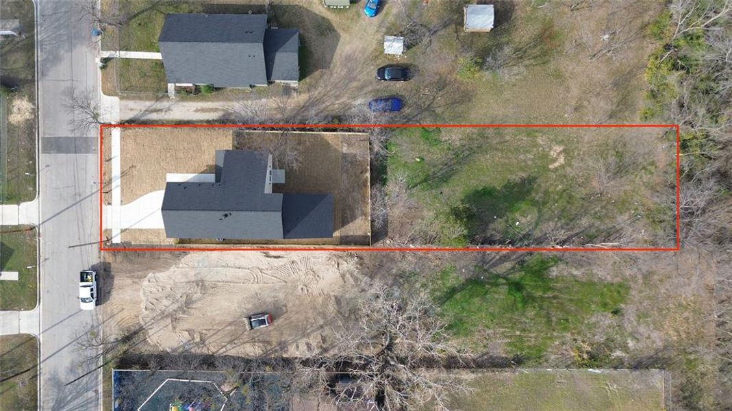 Aerial overview of property's location with property parcel outlined