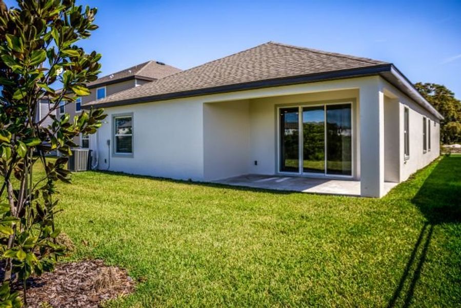 Exterior details and patio area of a home in Palm Coast, Palm Coast (Image 3).