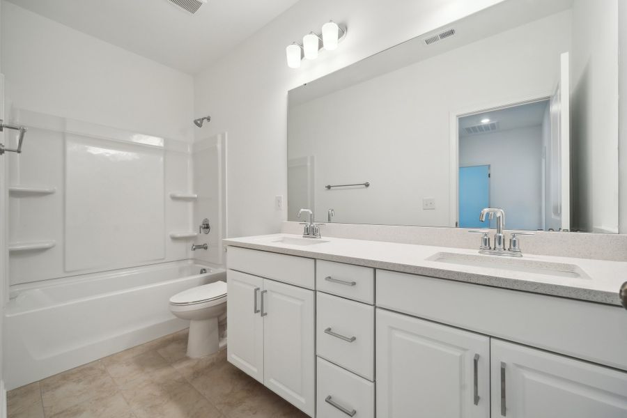 Furnished interior view inside a new home in The Coves on Lake Wylie, Charlotte (Image 9).