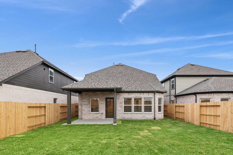 Exterior details and patio area of a home in Marvida, Cypress (Image 3).