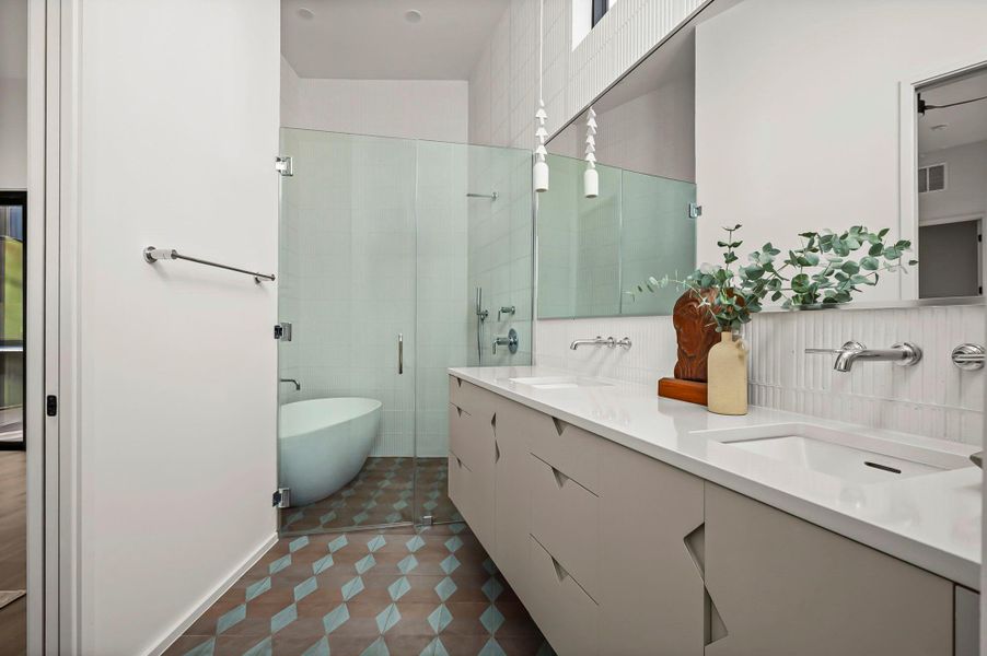 Primary bathroom with double vanity and soaking tub and shower Primary bathroom with double vanity and soaking tub and shower