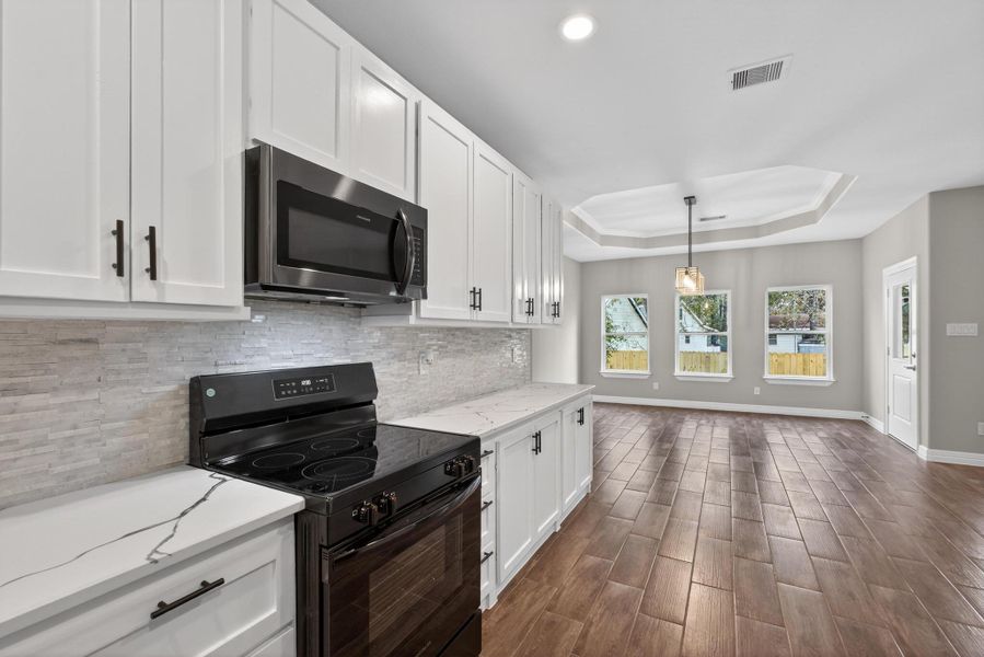 Furnished interior view inside a new home in , Willis (Image 7).