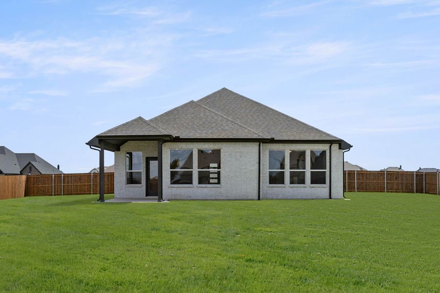 Exterior details and patio area of a home in Coyote Crossing, Godley (Image 4). Exterior details and patio area of a home in Coyote Crossing, Godley (Image 4).